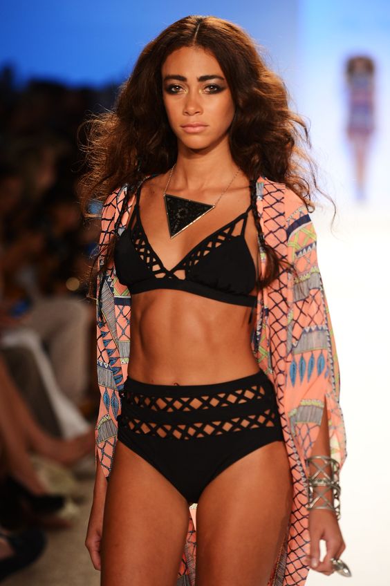 A model walks the runway at the Mara Hoffman show during Mercedes-Benz Fashion Week Swim 2013 at The Raleigh on July 21, 2012 in Miami Beach, Florida.